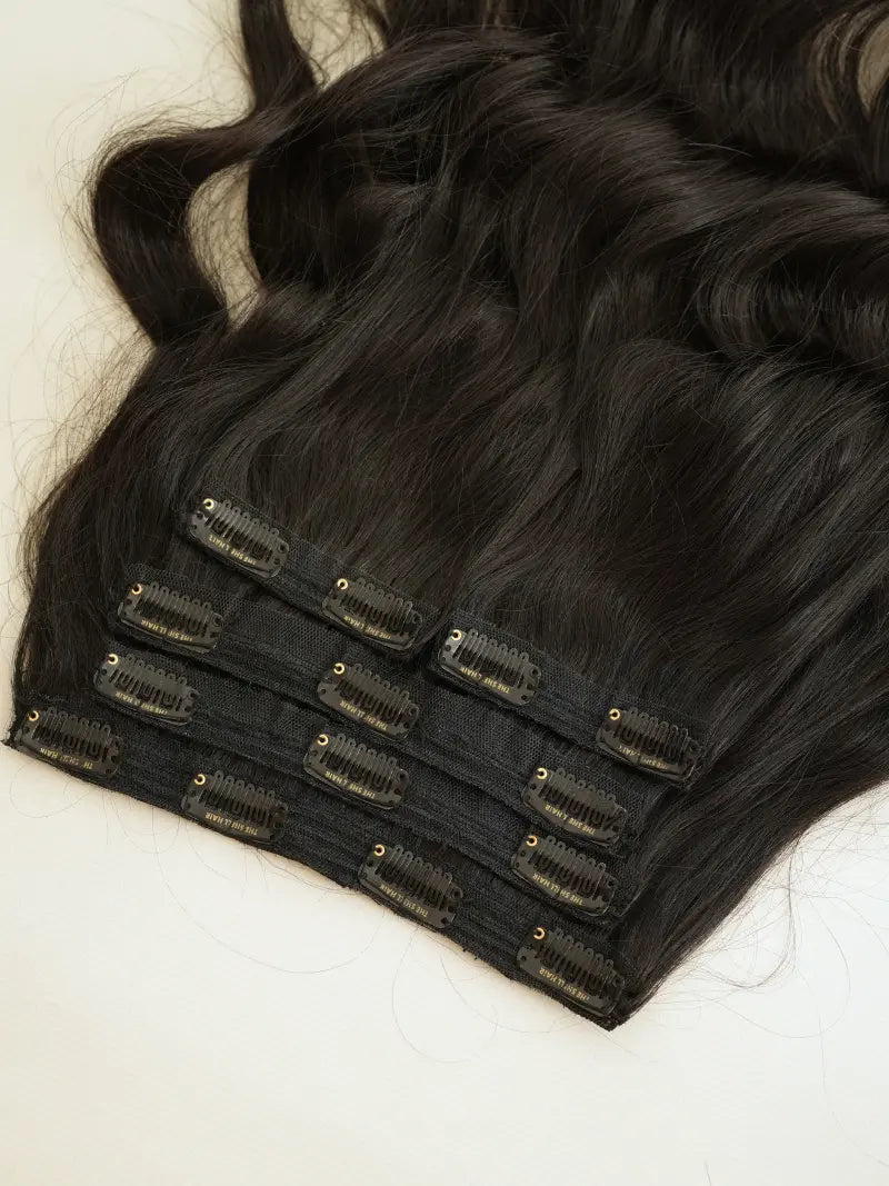 Last image of five set clip in hair extensions for ladies