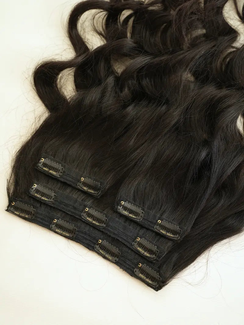First image of four set clip in hair extensions