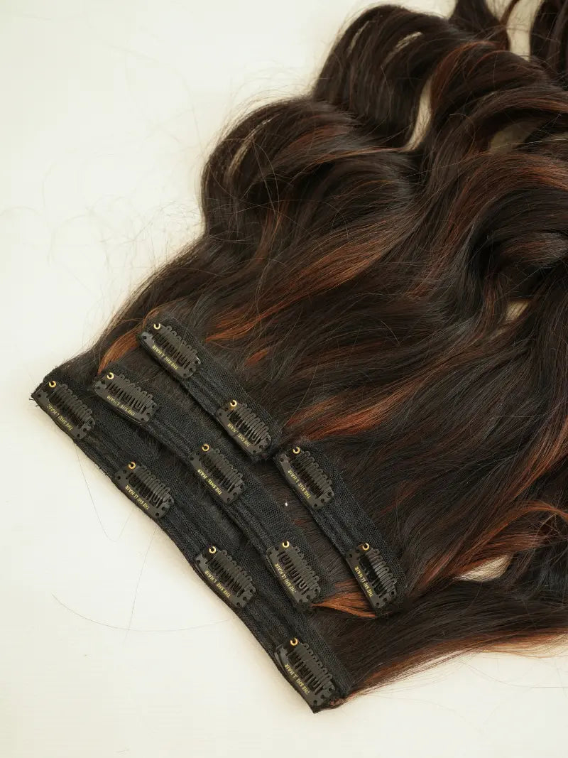 First image of four set clip in extensions with highlights