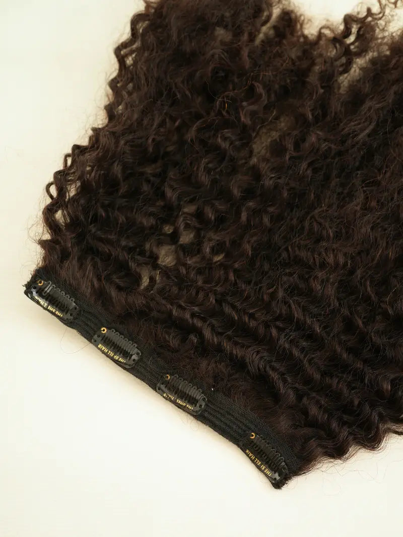 First image of curly hair extensions